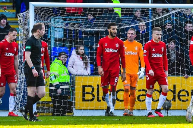 The Rangers players react after St Johnstone score their equaliser in Sunday's 2-2 draw