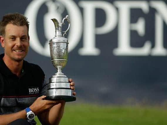 Henrik Stenson shows off the Claret Jug after his win at Royal Troon in 2016. Picture: Getty Images