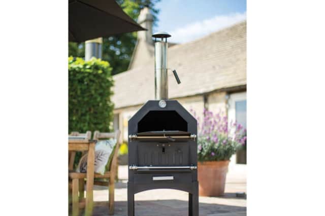 The oven has multiple functions, allowing you to also make barbecue-style treats, or smoke fish and meats. (Credit: Lidl)
