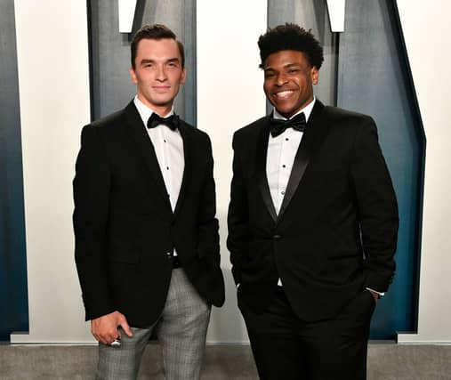 The TV star, pictured right, has been arrested on charges of producing child sex images (Photo: Getty Images)