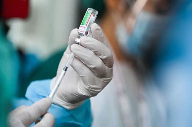 AstraZeneca is 'two months behind production; (Photo: YE AUNG THU/AFP via Getty Images)