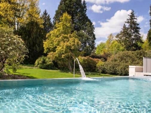 Theres nothing more luxurious than chilling in an outdoor infinity pool of this grandeur  located in 300-acre woodland and featuring a stunning roof top spa.